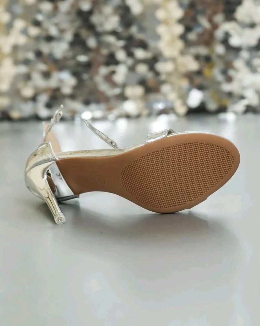 Silver High Heels Stiletto (Category: Heels) located in Taguig. Submitted by thepinkrabbit (Listing ID 1248709022, Image 2). Description: Used once for birthday party More on my IG page ----> @pinkrabbit.ph Payment channels: - BPI, BDO, Gcash Shipping options: - Shoppee Checkout (with fees) - LBC/JRS - Grab Express/Lalamove/Angkas Can do meetup in BGC areas only..