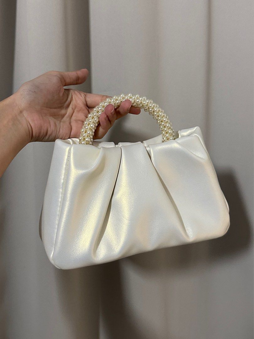 White pearl handbag