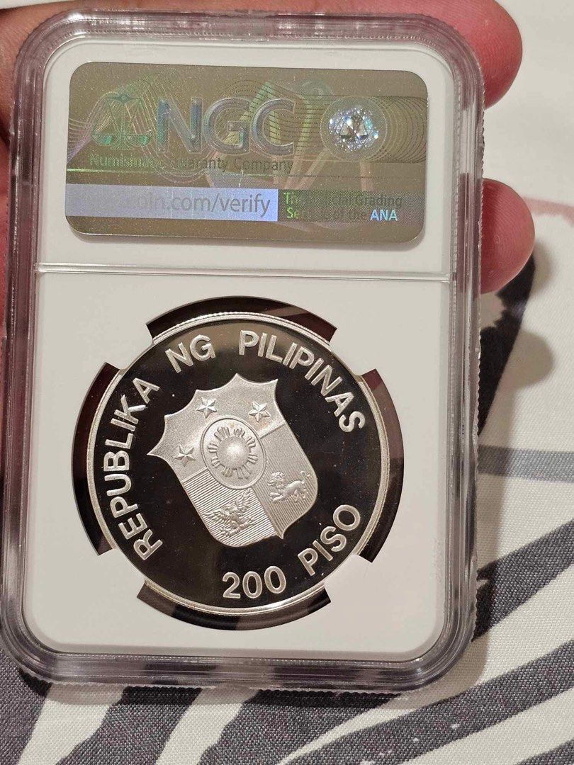 200p silver tamaraw coin (Category: Currency) located in Cordova. Submitted by cebucollector (Listing ID 1248975780, Image 2). Description: 200p world wildlife fund Ngc graded as pf69 What you see is what u get.