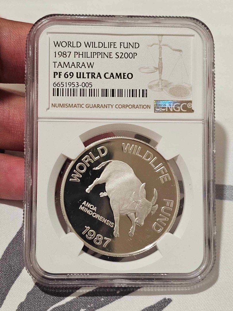 200p silver tamaraw coin (Category: Currency) located in Cordova. Submitted by cebucollector (Listing ID 1248975780, Image 1). Description: 200p world wildlife fund Ngc graded as pf69 What you see is what u get.
