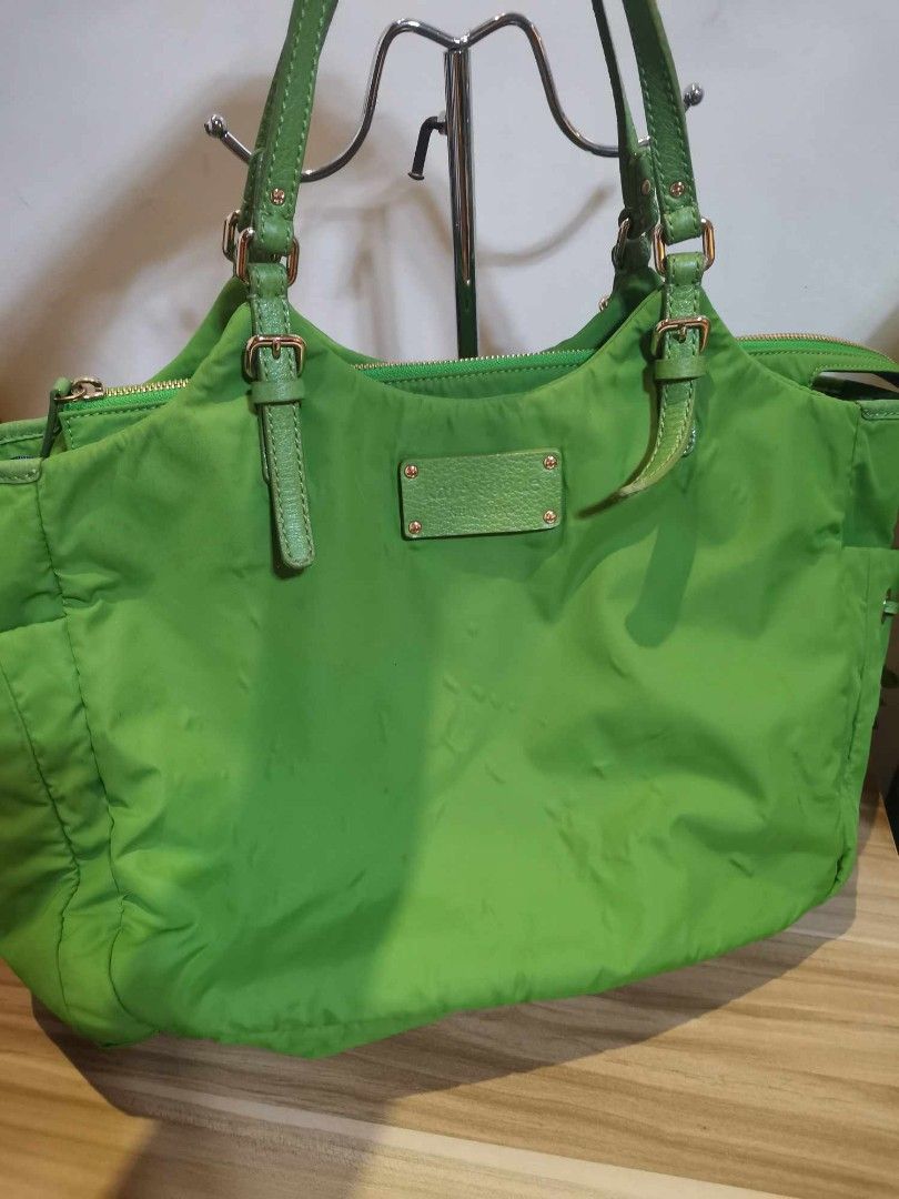 💯SALE Authentic Preloved Kate Spade (Category: Luxury Bags & Wallets) located in Taguig. Submitted by nanzmango (Listing ID 1249024206, Image 1). Description: 💯 Authentic Preloved Kate Spade large tote bag ( green ) color - bought in Japan Auction - well used , signs of usage in the nylon bag , some floating fabric . - Bag only - not for fussy buyers, bawal po sa maselan - pang travel Still Negotiable for sure buyer..