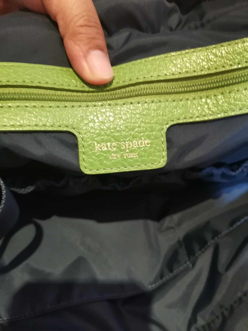 💯SALE Authentic Preloved Kate Spade (Category: Luxury Bags & Wallets) located in Taguig. Submitted by nanzmango (Listing ID 1249024206, Image 2). Description: 💯 Authentic Preloved Kate Spade large tote bag ( green ) color - bought in Japan Auction - well used , signs of usage in the nylon bag , some floating fabric . - Bag only - not for fussy buyers, bawal po sa maselan - pang travel Still Negotiable for sure buyer..