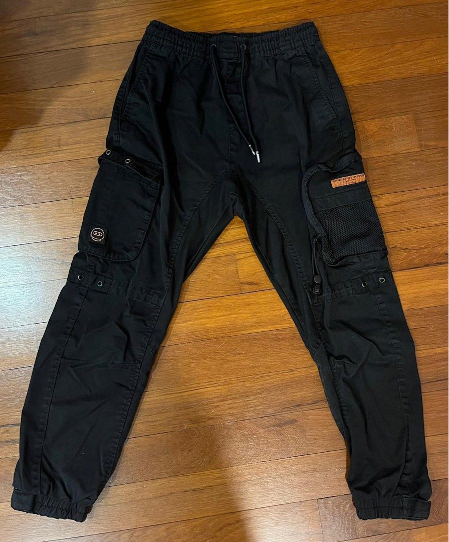 Bershka parachute cargo pants in black | ASOS