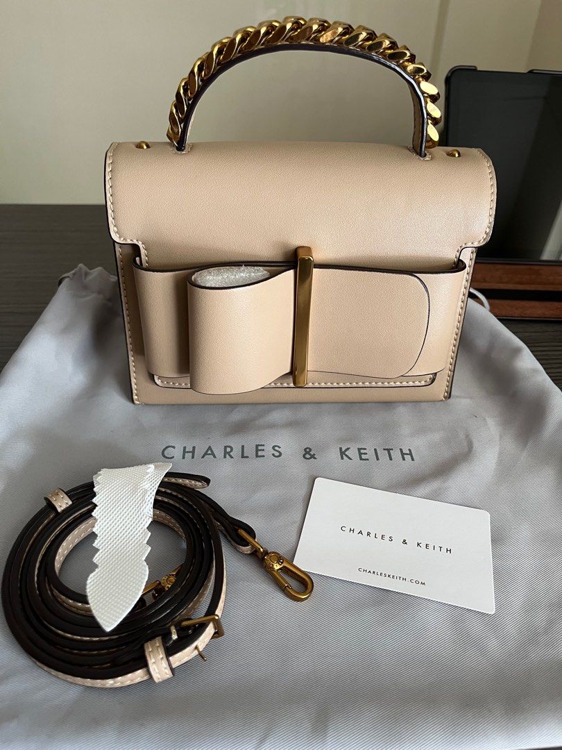 Charles & keith chunky metal best sale top handle bow flap bag