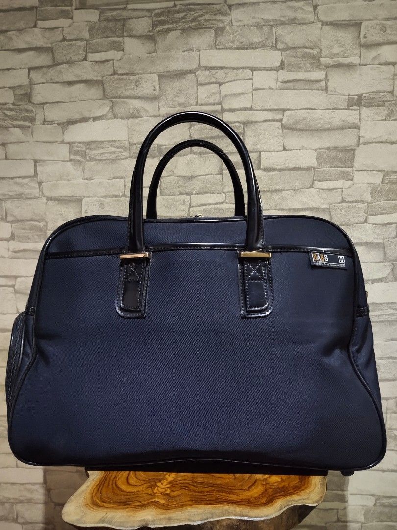 Daks travel bag sales