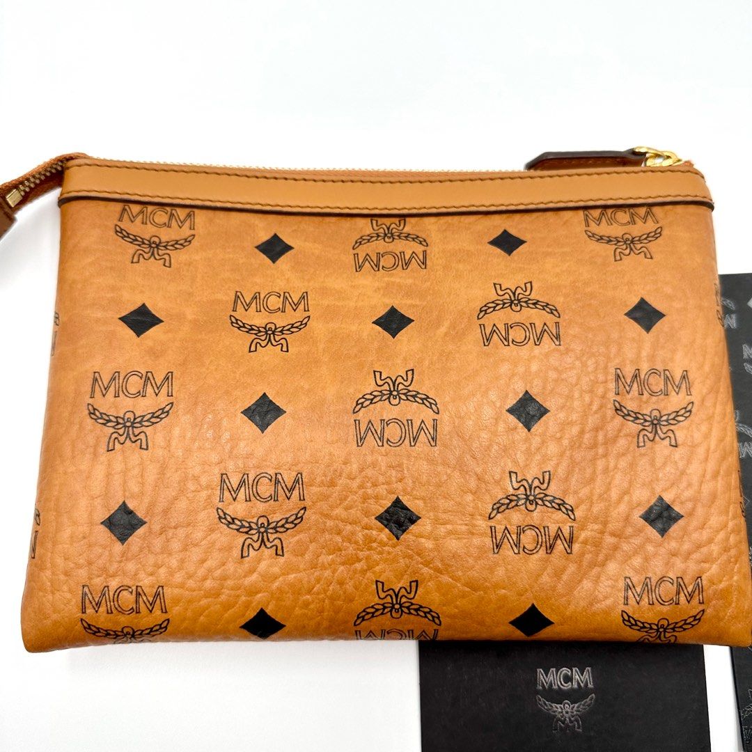 Mcm new arrivals pouch sale