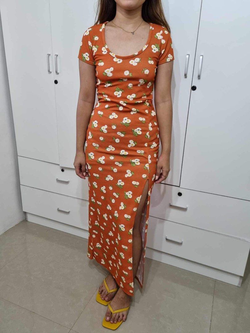 Floral Midi Dress with Slit (Category: Evening dresses & gowns) located in Bocaue. Submitted by mjpvv (Listing ID 1248952388, Image 1). Description: Worn once From boohoo Fits small-medium No flaws .
