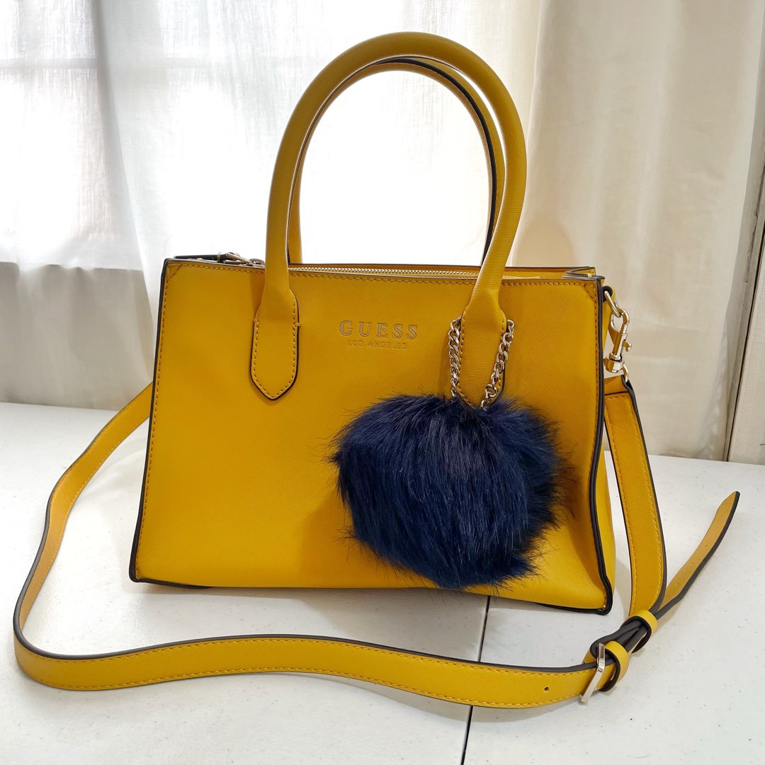 Guess yellow sling bag Clearance