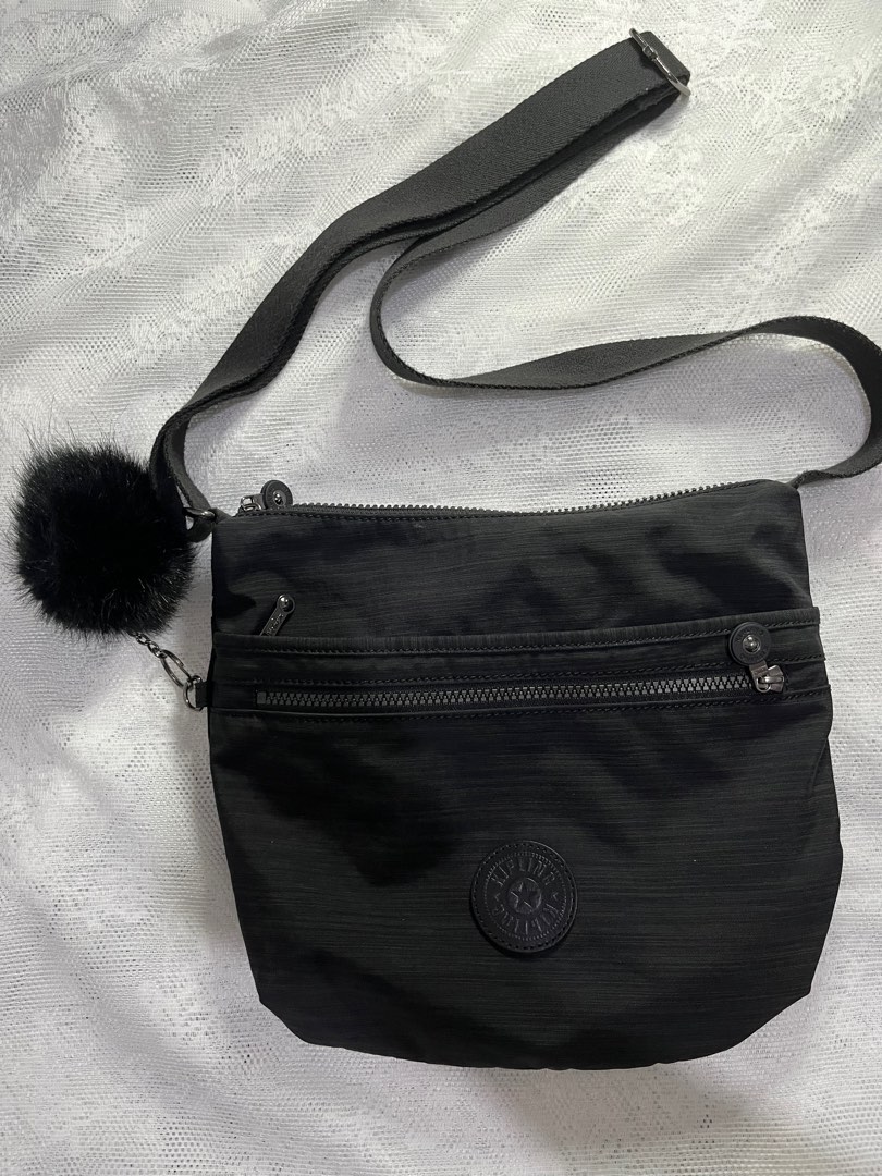 Authentic Kipling cross body sling black bag on Carousell