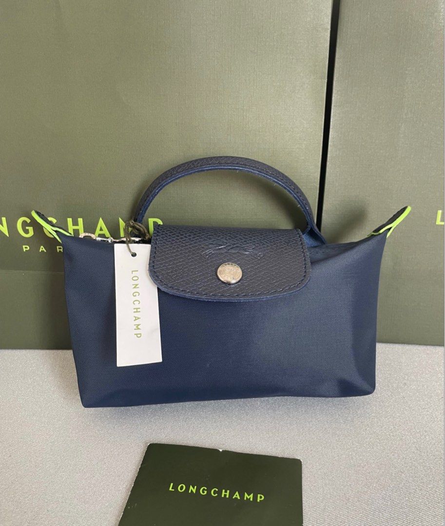 longchamp Le Pliage Neo Pouch in marine, Luxury, Bags & Wallets on Carousell