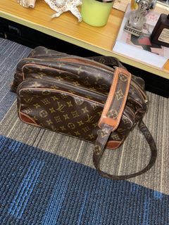 Sold at Auction: LOUIS VUITTON. NILE MODEL BAG, CIRCA 2000.