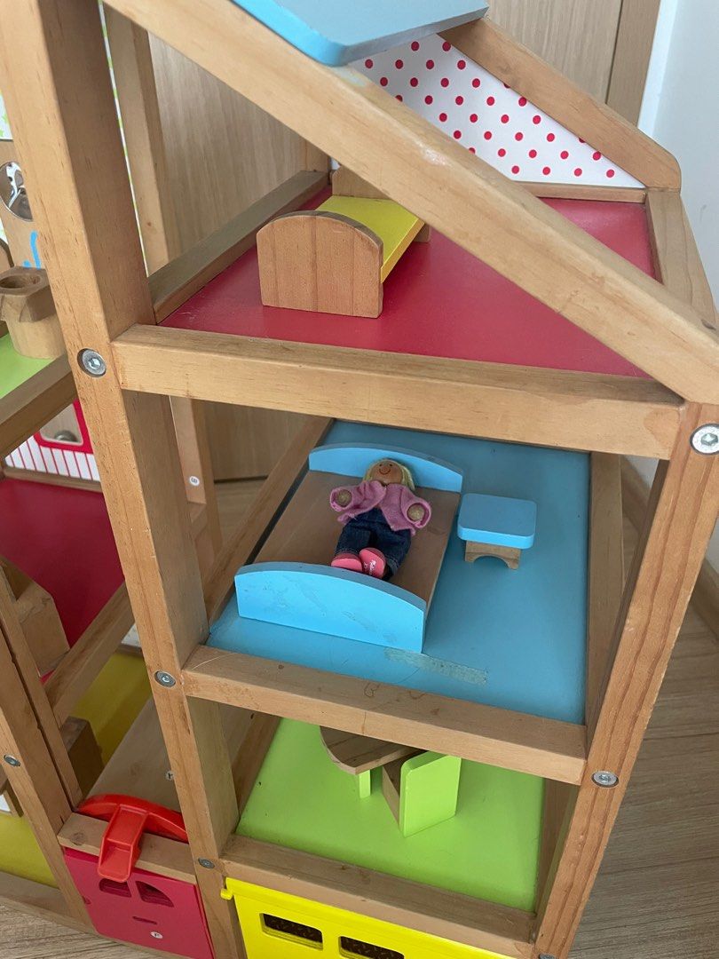 Melissa and doug hi rise wooden dollhouse hot sale