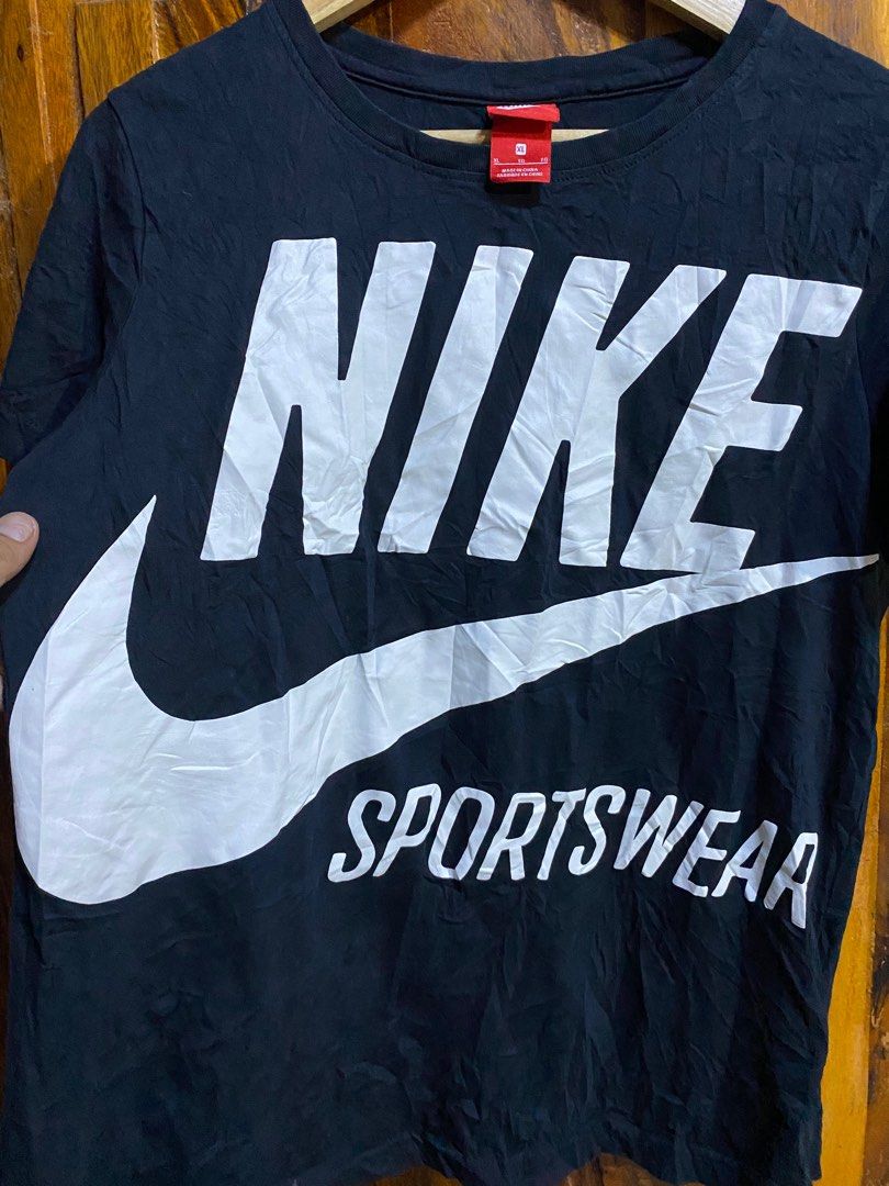 nike logo size on shirt