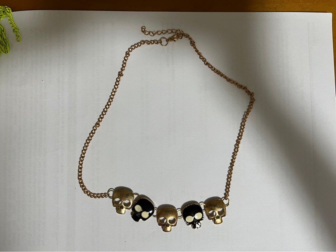 Gold hotsell skull necklace