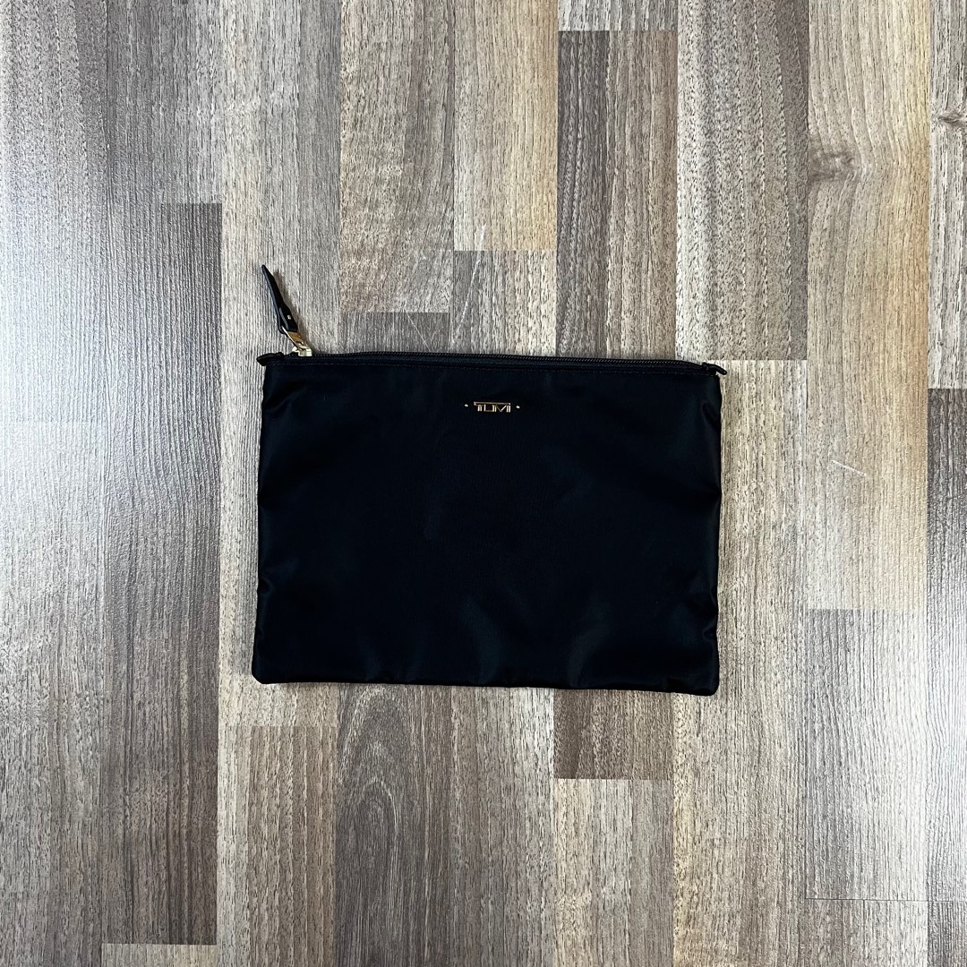 Tumi clutch bag (authentic) on Carousell