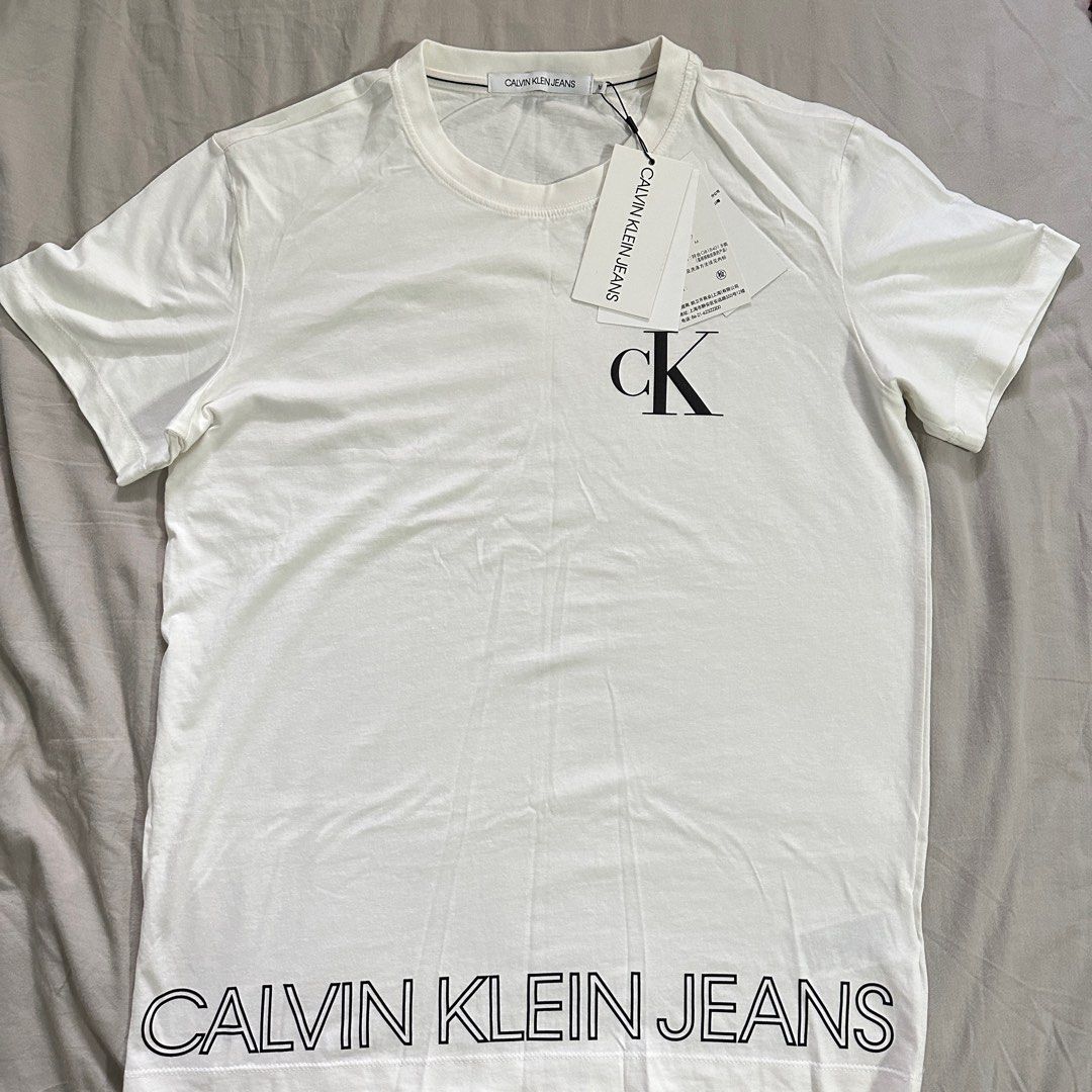 Calvin Klein shirt, Men's Fashion, Tops & Sets, Tshirts & Polo Shirts on  Carousell