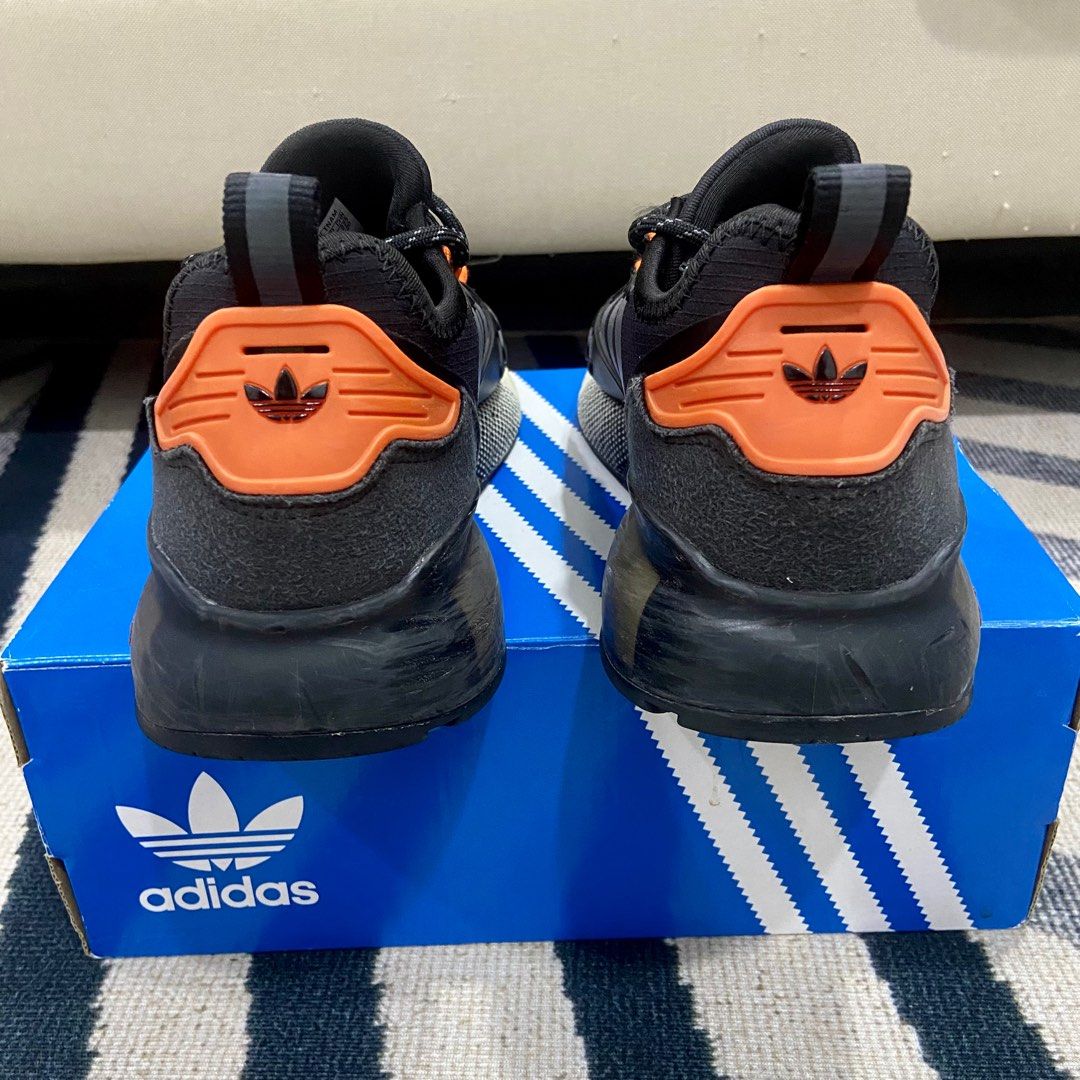 Originals nmd r1 deals junior black and orange