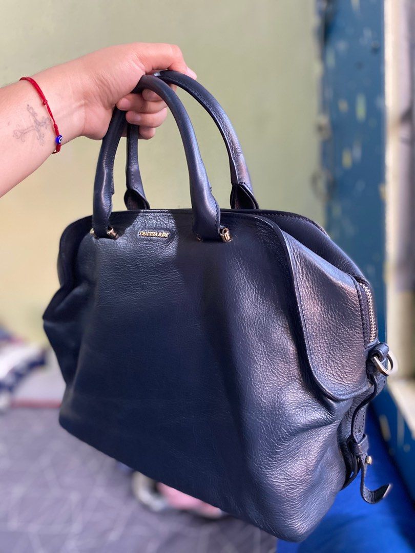 Authentic TRUSSARDI with sling (Category: Luxury Bags & Wallets) located in Meycauayan. Submitted by thriftyhaven2023 (Listing ID 1249187305, Image 3). Description: Guaranteed authentic Normal signs of usage only Medium size with sling.