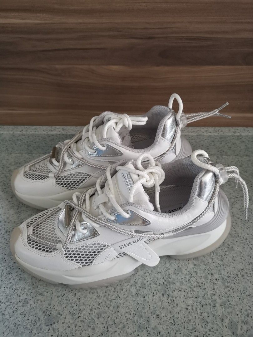 Shoes and bag set 100 for both. Hurry up grab Brand new STEVE MADDEN pretty trendy shoes silver bag. Shoes bought at 129. Bag bought at 59. Both