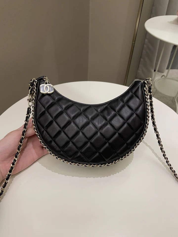 Chanel 23P Quilted Chain Around Hobo Bag Black Lambskin, Women's Fashion,  Bags & Wallets, Cross-body Bags on Carousell