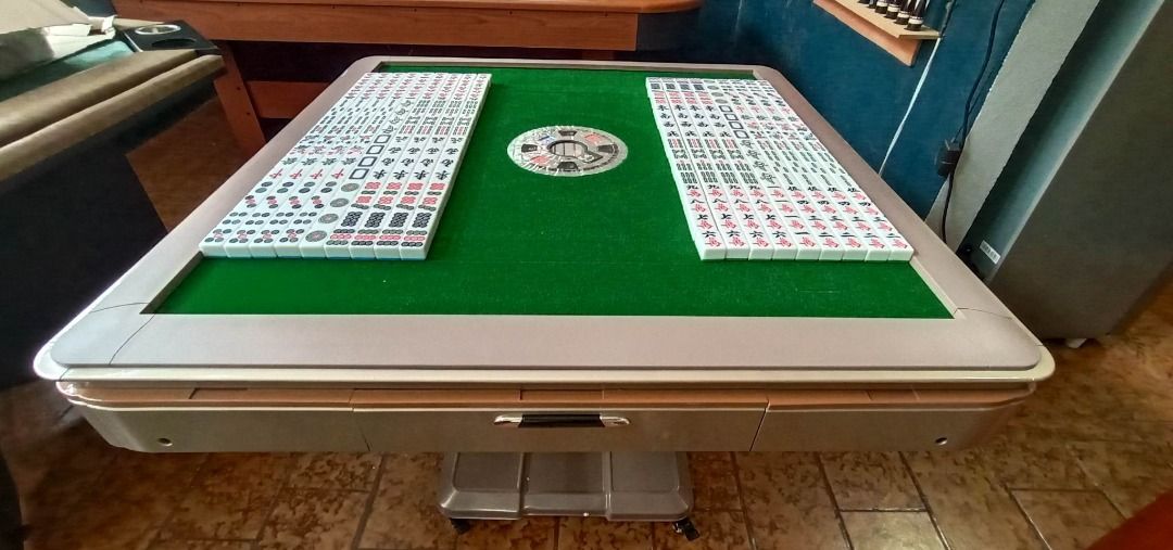 FOLDABLE MAHJONG TABLE (Category: Tables & Sets) located in San Pablo. Submitted by ablpsports (Listing ID 1249153354, Image 3). Description: AUTOMATIC MAHJONG TABLE 👉Automatic Mahjong Tables are fantastic as you save a lot of time when it comes to wall building, and you get to play a lot more games. They also save you a lot of wall building fatigue, shoulder and finger strain, and they are a huge headache-saver when you want to teach someone ne