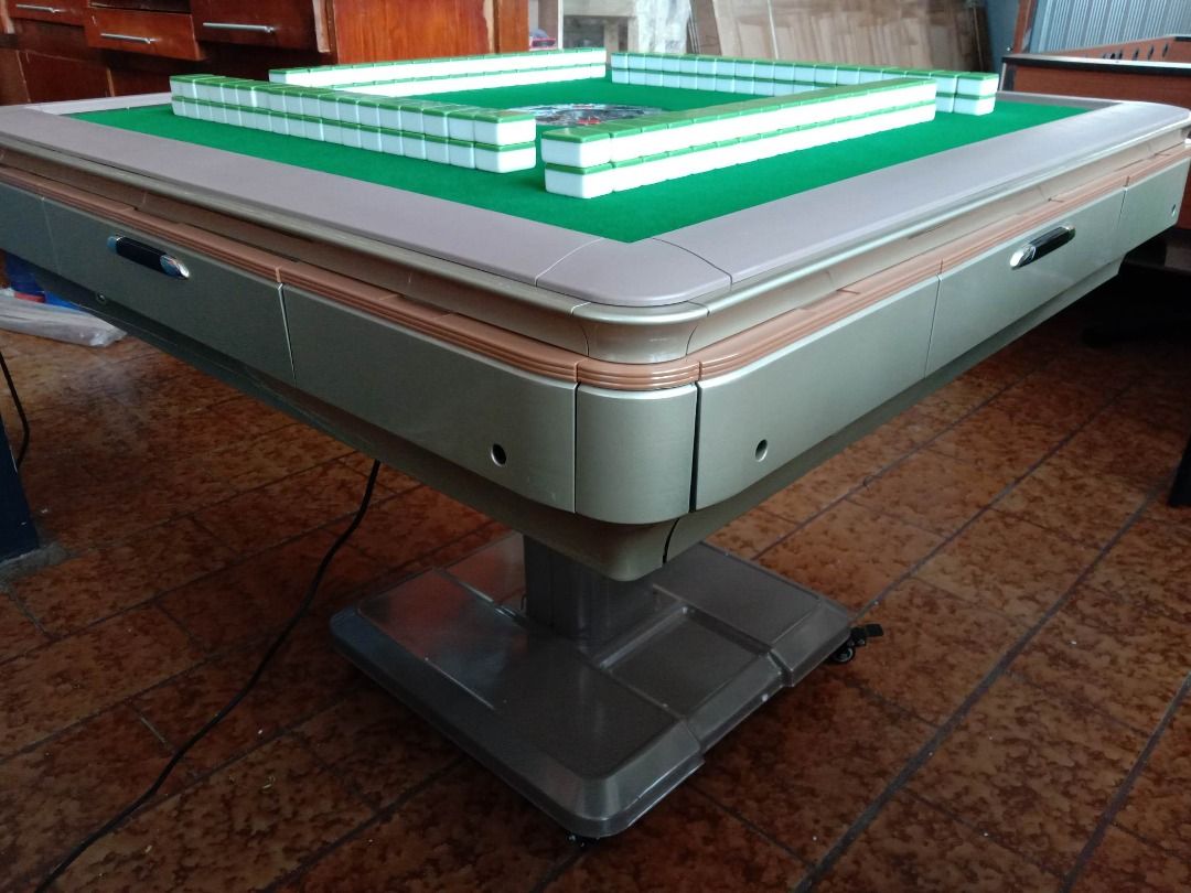 FOLDABLE MAHJONG TABLE (Category: Tables & Sets) located in San Pablo. Submitted by ablpsports (Listing ID 1249153354, Image 1). Description: AUTOMATIC MAHJONG TABLE 👉Automatic Mahjong Tables are fantastic as you save a lot of time when it comes to wall building, and you get to play a lot more games. They also save you a lot of wall building fatigue, shoulder and finger strain, and they are a huge headache-saver when you want to teach someone ne