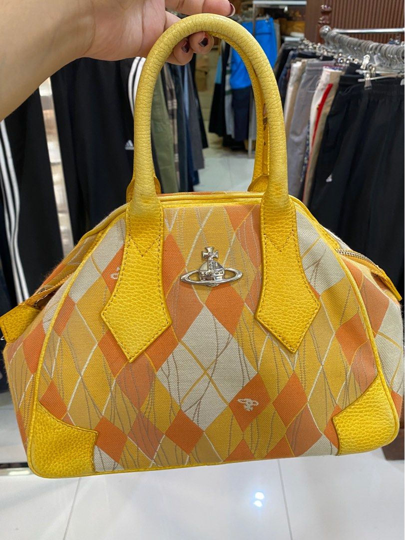Yellow vivienne discount westwood bag