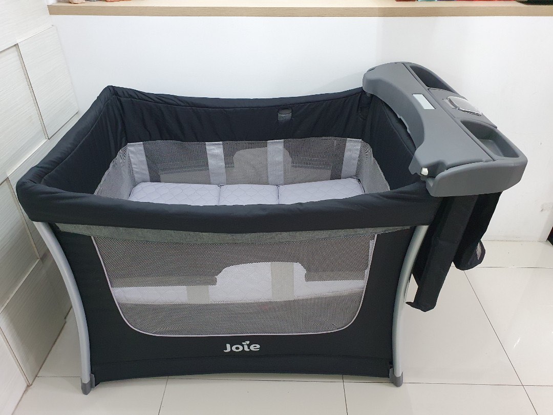 Joie illusion deals travel cot