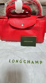 Longchamp Le Pliage mini cuir, Women's Fashion, Bags & Wallets, Purses &  Pouches on Carousell