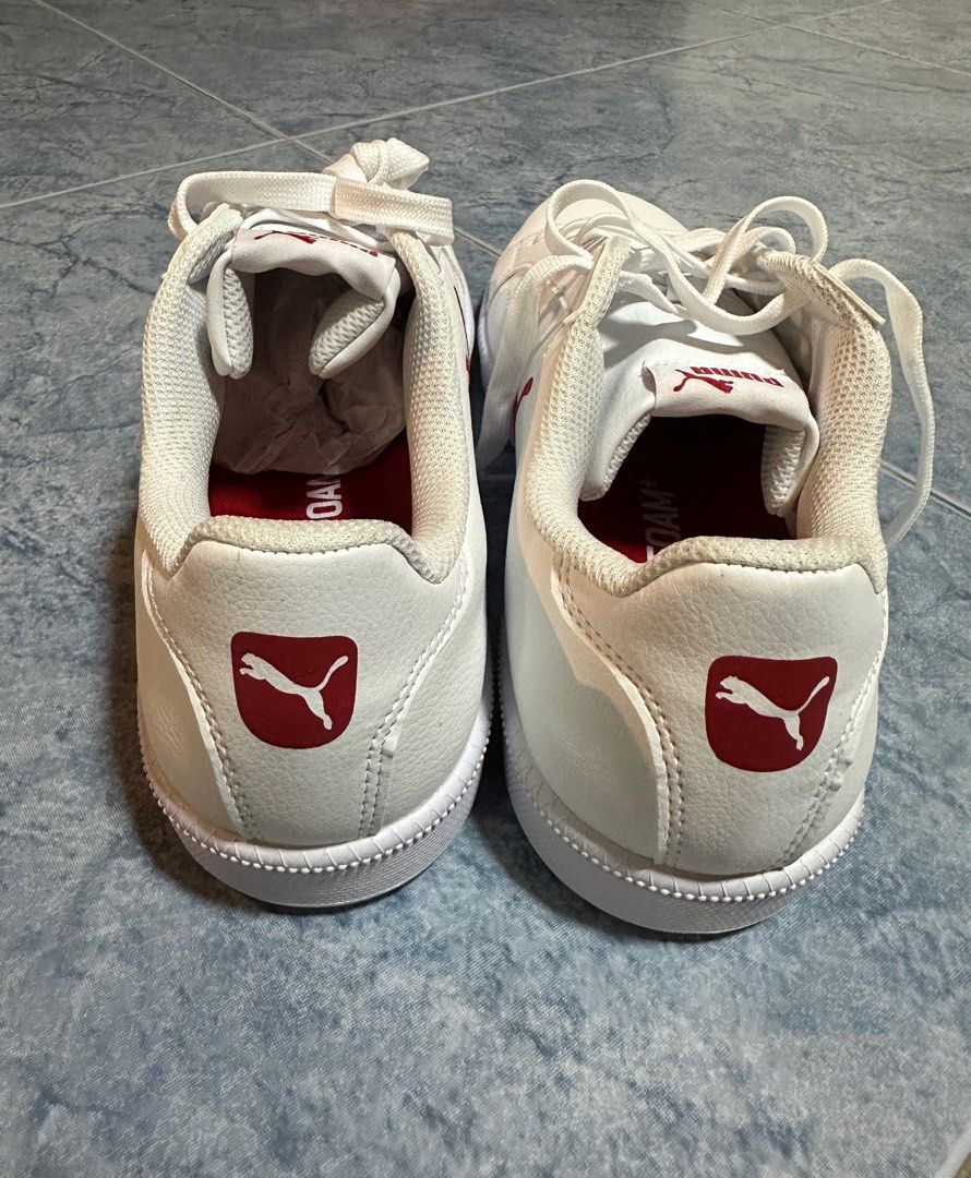 White pumas on sale with red stripe
