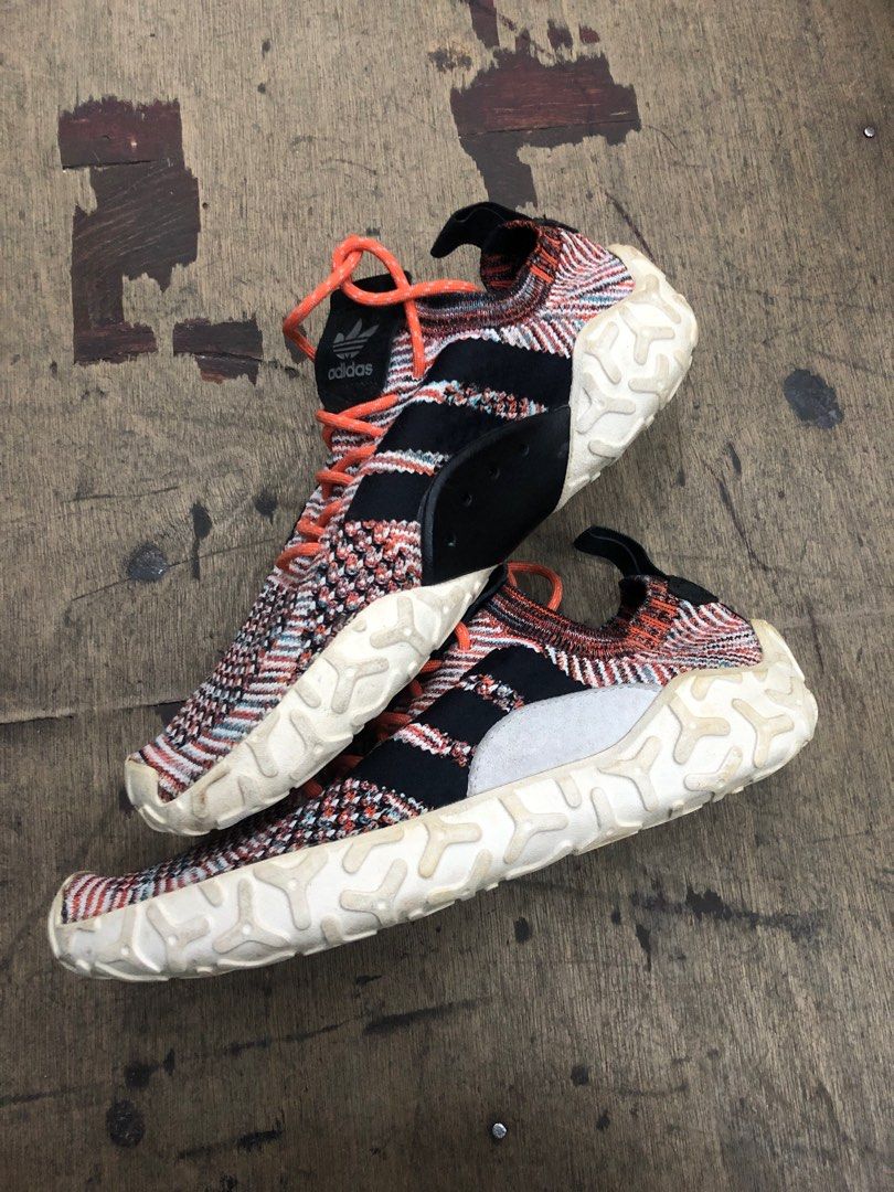 Adidas originals f/22 primeknit sneakers in orange discount