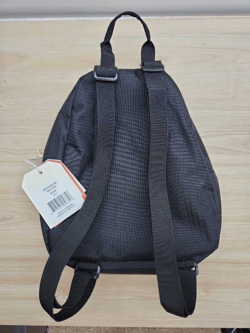 Backpack (Category: Backpacks) located in Singapore. Submitted by Jaime (Listing ID 1249336361, Image 3). Description: Brand new black jansport half pint 10l bag pack. Height -27cm Side to side -22cm Width - 14cm.