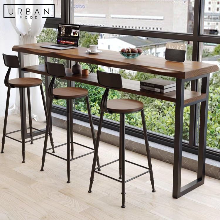 BILLY Rustic Solid Wood Bar Table (Category: Tables & Sets) located in Singapore. Submitted by collectic (Listing ID 1249307673, Image 2). Description: Shop Now: https://urbanmood.sg/products/billy-rustic-solid-wood-bar-table Redefine your bar area or outdoor lounge with our BILLY bar table. Crafted from pine wood in a beautiful matte walnut finish, its natural wavy edge adds an organic touch to your space. A convenient shelf beneath offers stora
