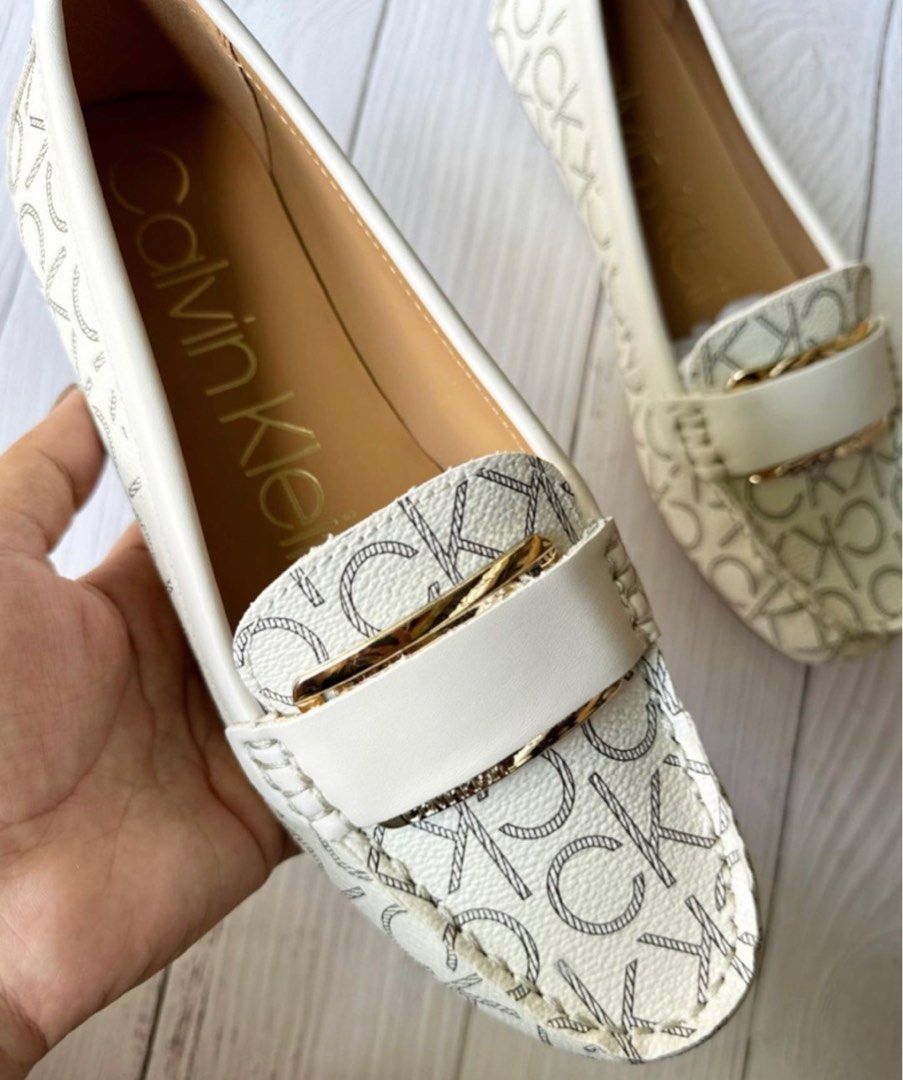 Calvin klein gold loafers hotsell