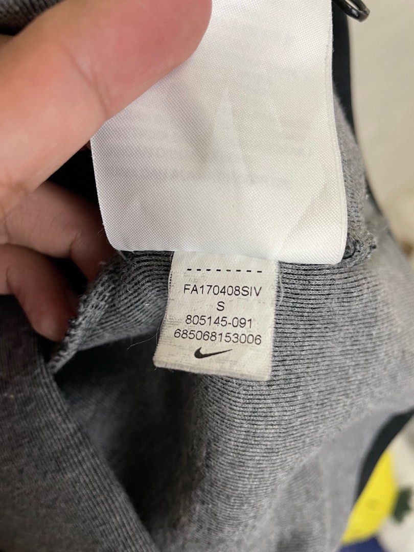 dark gray nike tech fleece