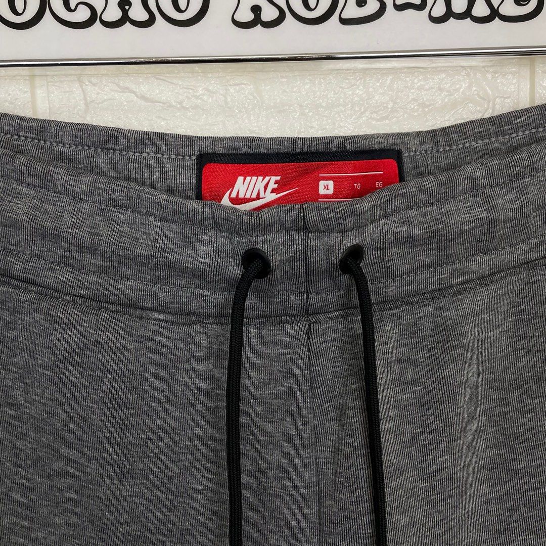 dark gray nike tech fleece