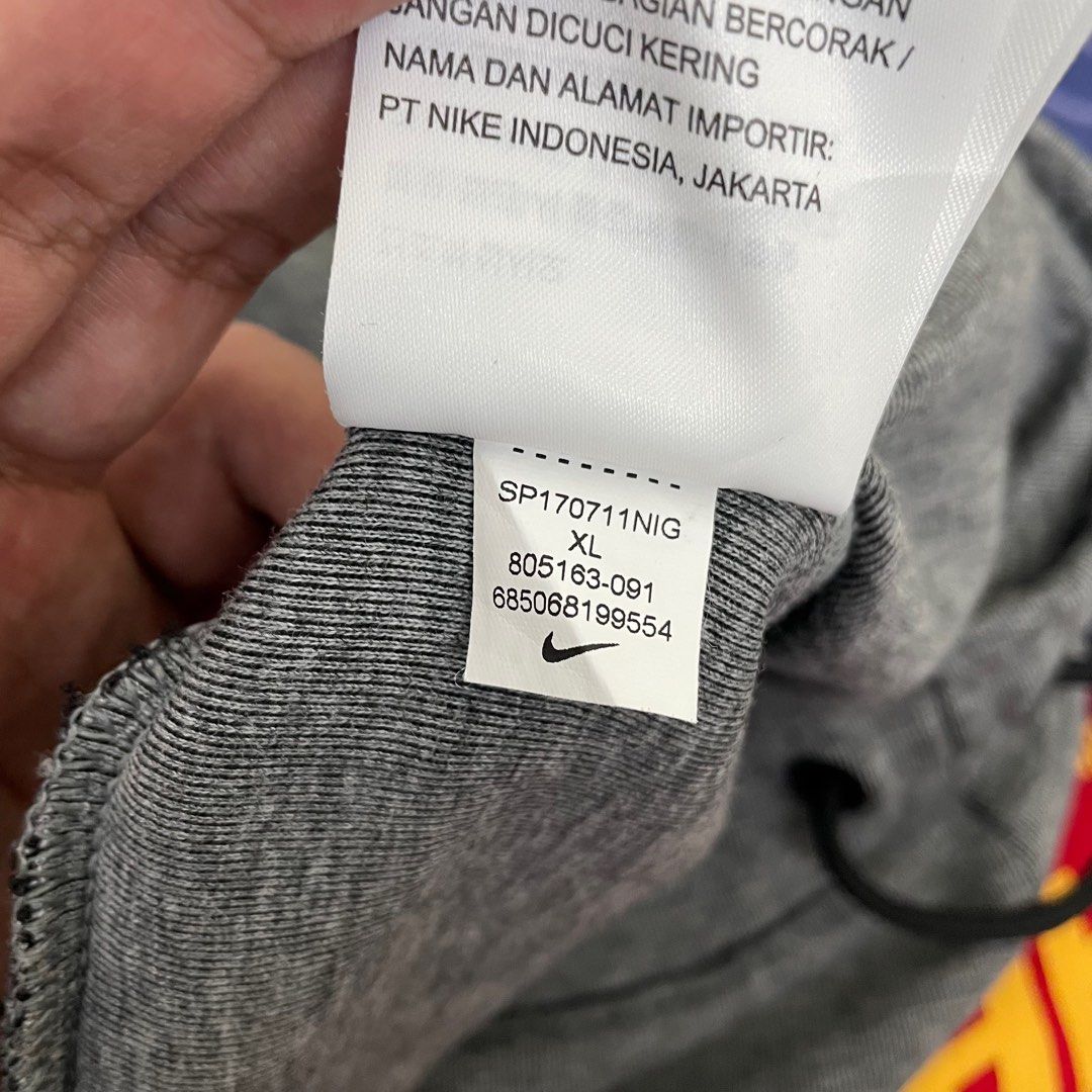 dark gray nike tech fleece