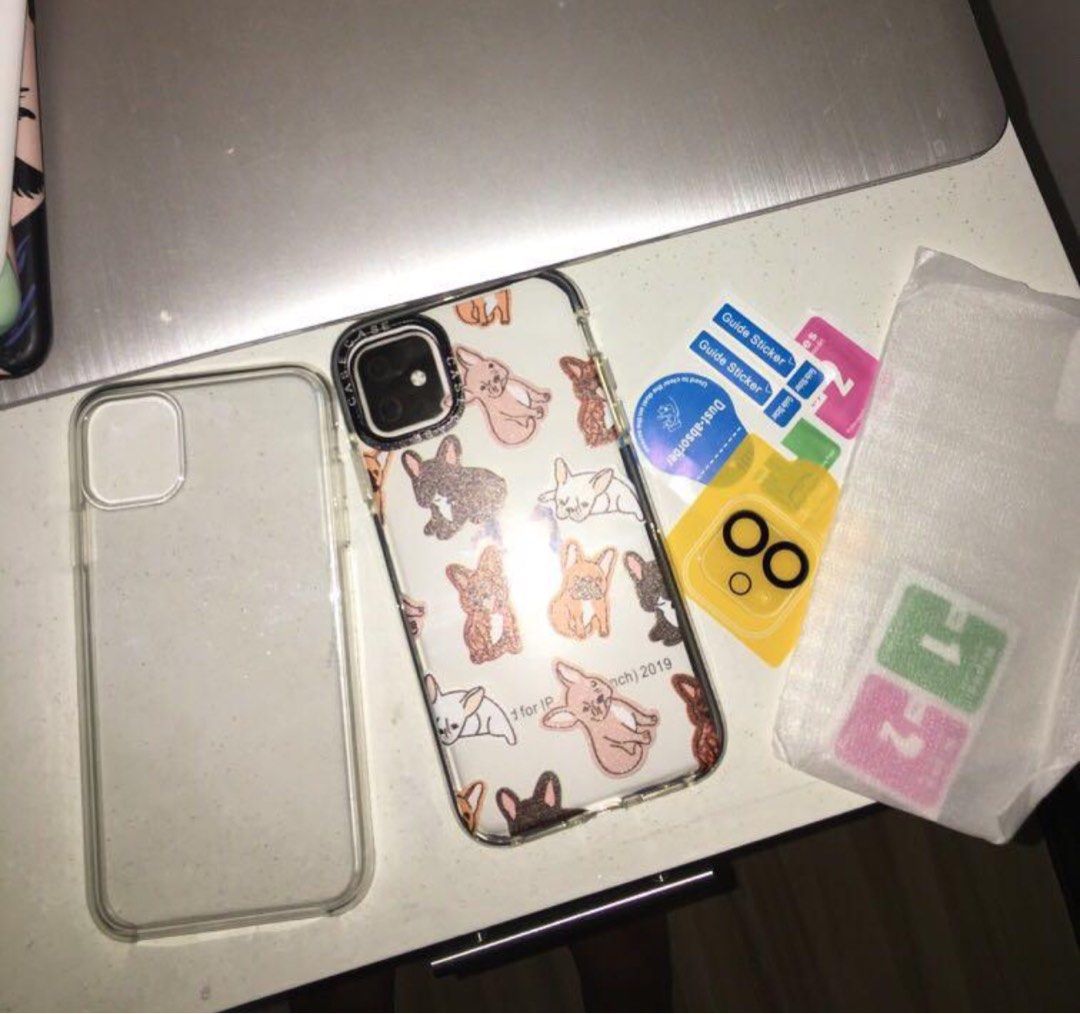 Iphone 11 case & protector bundle (Category: Cases & Sleeves) located in Mangatarem. Submitted by prelovedbymisty (Listing ID 1249384583, Image 1). Description: 2- CASE 1-TEMPERED GLASS 1-LENSE PROTECTOR 100 EACH (kung ayaw bundle) .