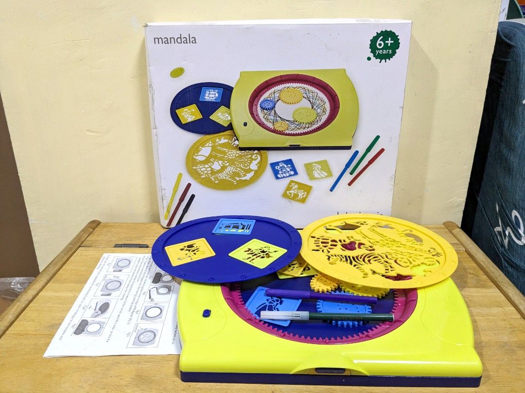 John Lewis & Partners Mandala Drawing & Stencil Set (Category: Craft Supplies & Tools) located in Manila. Submitted by little_ek_house (Listing ID 1249375754, Image 2). Description: Selling: John Lewis & Partners Mandala Drawing & Stencil Set UK imported Dimensions: H:28 x W:34 x D:3cm Encourages creativity, imagination as well as arts and craft skills This ingenious classic Mandala drawing set creates hundreds of colourful and intricate patterns