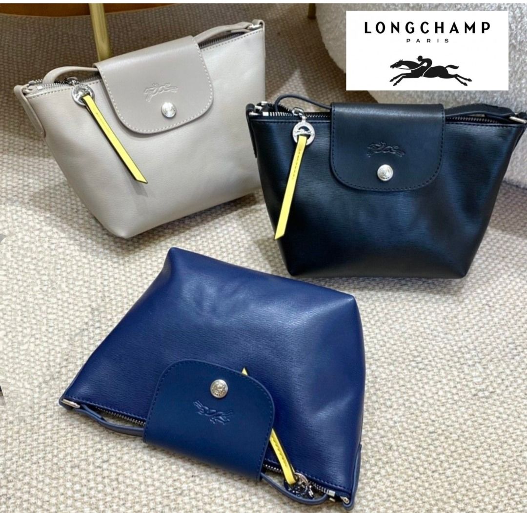 Longchamp Pouch With Handle In Cognac, Luxury, Bags & Wallets on Carousell