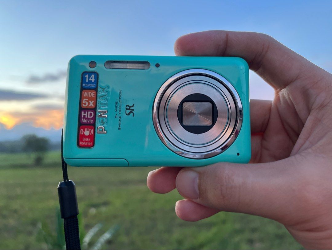 Pentax Optio S1 14MP Compact Digital Camera (Category: Cameras) located in Manila. Submitted by mmeowsz (Listing ID 1249385920, Image 1). Description: ✨Pentax Optio S1 14MP Compact Digital Camera ⤷ ₱5,500 ⤷ no issue ⤷ fully functional ⤷ inclusions: unit, battery, universal charger, strap, sd card, leather case • High Resolution 14MP Sensor • 5x Wide-Angle 28-140mm Optical Zoom Lens • 1280x720p HD Video • Bright 2.7" LCD Monitor Screen • Shake Red