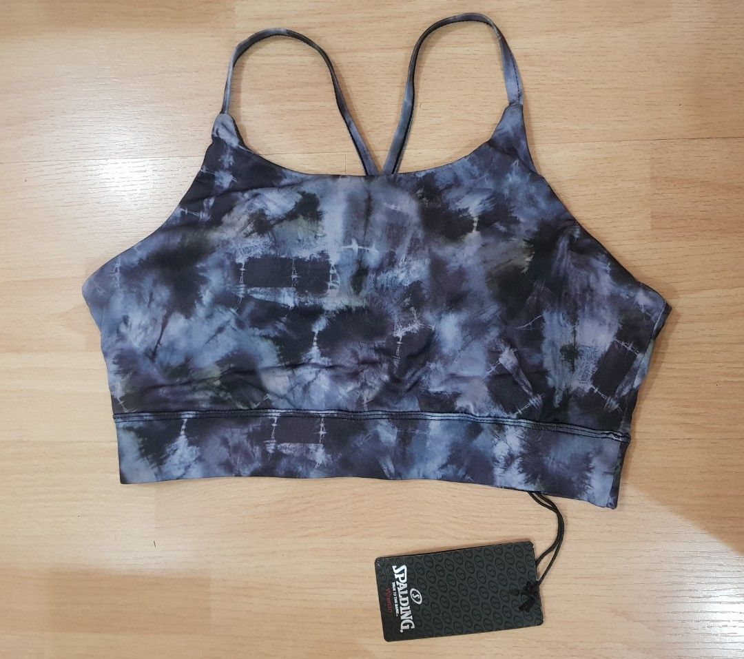 Spalding Sports Bra Bralette (Category: Activewear) located in Pasay City. Submitted by bbearyoon (Listing ID 1249335252, Image 1). Description: Spalding Medium on tag Has Padding Tape Measure (not sure if accurate): Underbust Band: 28in ++ stretchable Brand new with tag color: purpleish tiedye.
