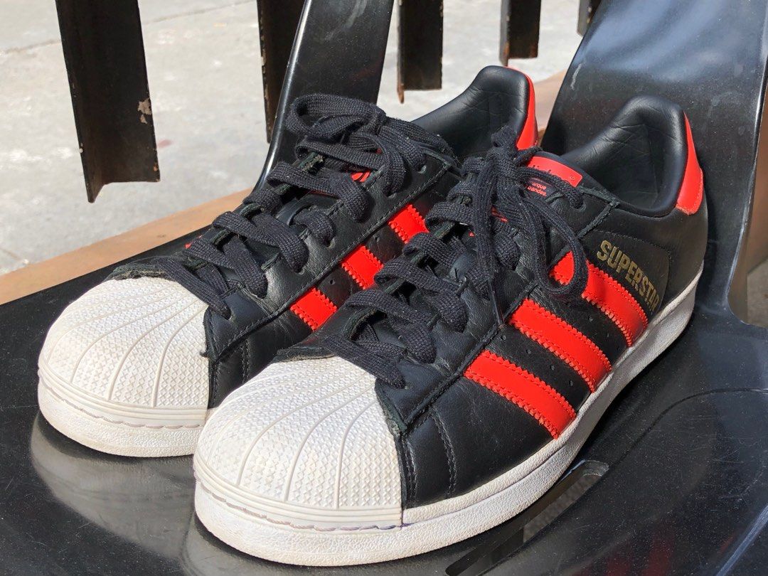 Adidas superstar black with red stripes clearance