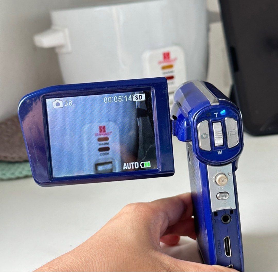 Camcorder (Category: Video Cameras) located in Manila. Submitted by battilba (Listing ID 1249483471, Image 1). Description: Inclusion - 2 batteries - 1 charger - strap 7/10 condition no back cover slight issue with zoom.