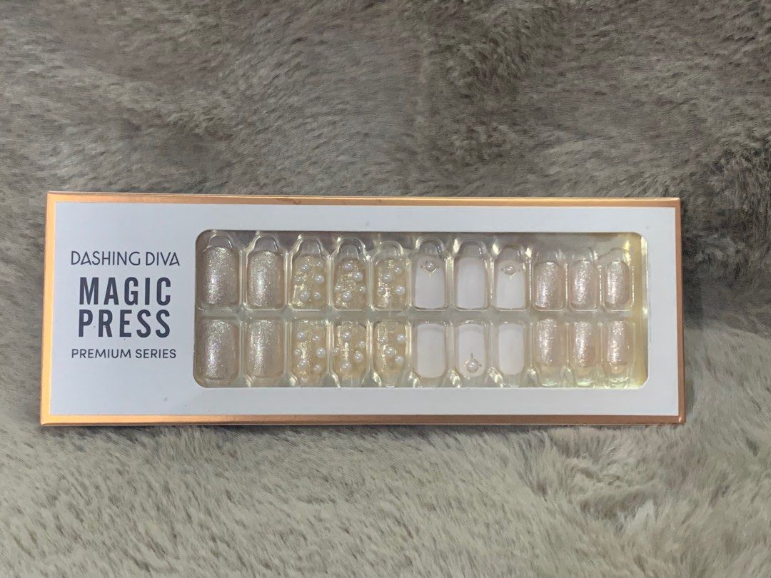 Dashing Diva Magic Press Premium Series-Seine White (Category: Hands & Nails) located in Quezon City. Submitted by glb.tan (Listing ID 1249475795, Image 1). Description: On hand Brand new 30 nails (12sizes) 1 prep pad 1 mini file 1 manicure stick Instruction sheet.