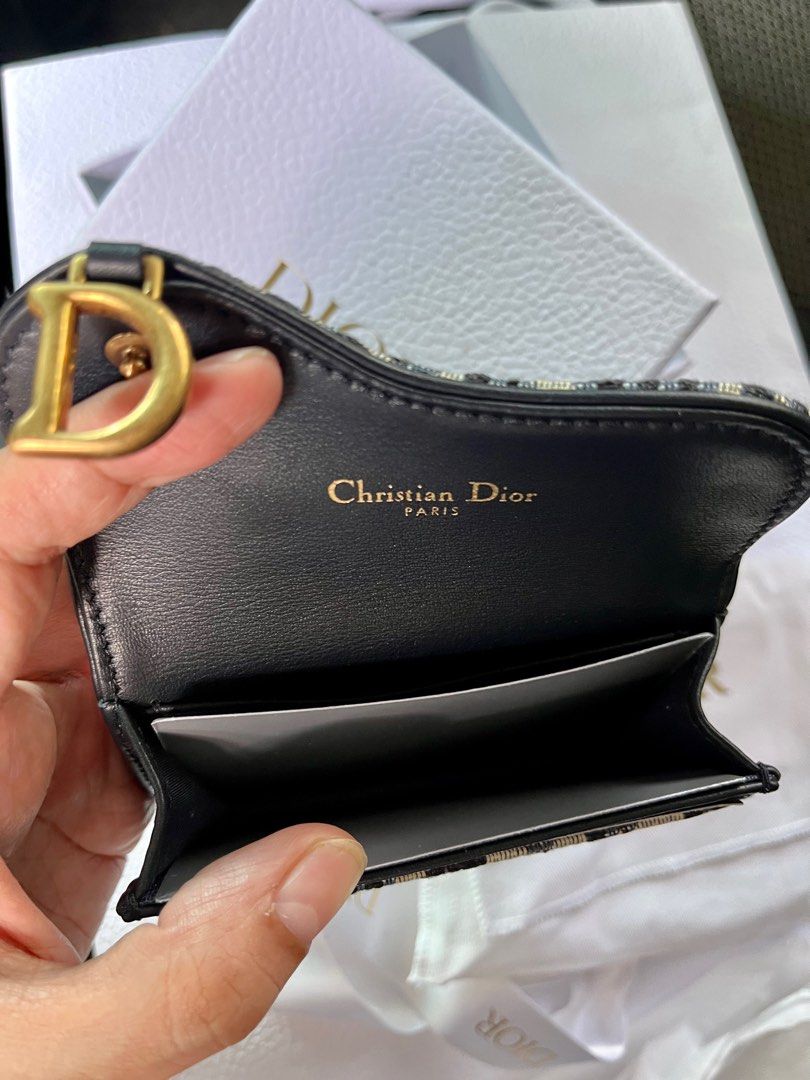 Dior Saddle Flap Card Holder (Category: Luxury Bags & Wallets) located in Manila. Submitted by folklore.ml (Listing ID 1249623612, Image 2). Description: Brand new Comes complete Ok pick up/lalamove Marikina Rfs declutter, no longer needed.