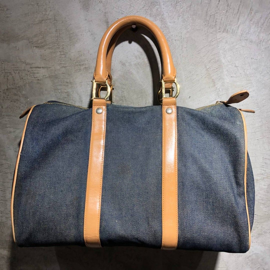 Dior Speedy 25 Denim Hand Bag (Category: Luxury Bags & Wallets) located in Quezon City. Submitted by johnpaulperezzz (Listing ID 1249525769, Image 2). Description: Dior Speedy 25 Denim Hand bag With Authenticity Card size: OS dimension: Width: 14" Length: 9" Depth: 8" Condition: 8/10 Issue: - Repainted Handle - Paint stain Price: 12.5k.
