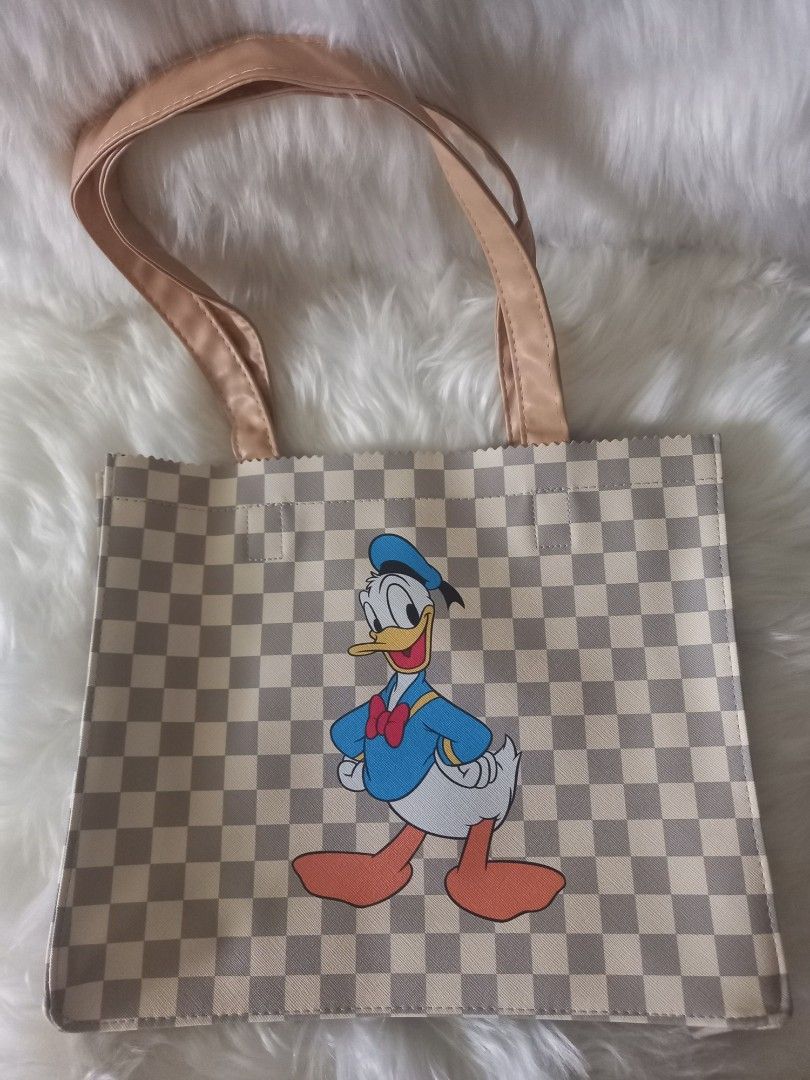 We're Ducky Over These New Donald Duck Bags From Harvey's - MickeyBlog.com