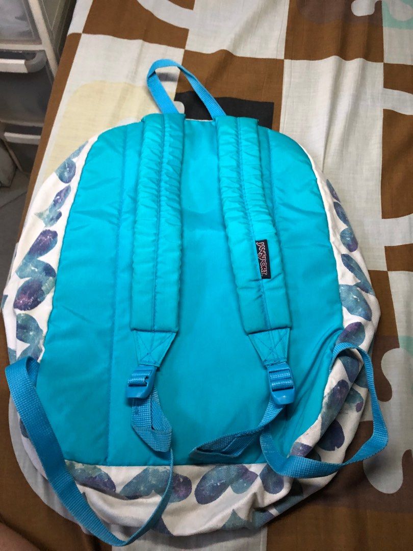 Jansport Heart Backpack (Category: Backpacks) located in Batangas. Submitted by prelovedbygianine (Listing ID 1249454948, Image 2). Description: Jansport Heart Denim Backpack Condition : 9/10 Issue : Ink Stain on Pocket.