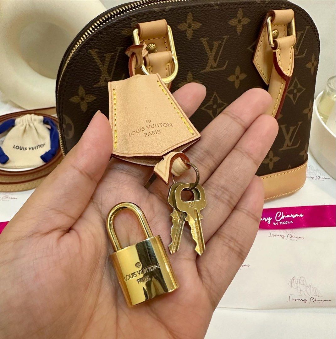 Louis Vuitton, Bags, New Never Used Alma Bb Iconic Monogram Canvas  Signature Golden Padlock Keys